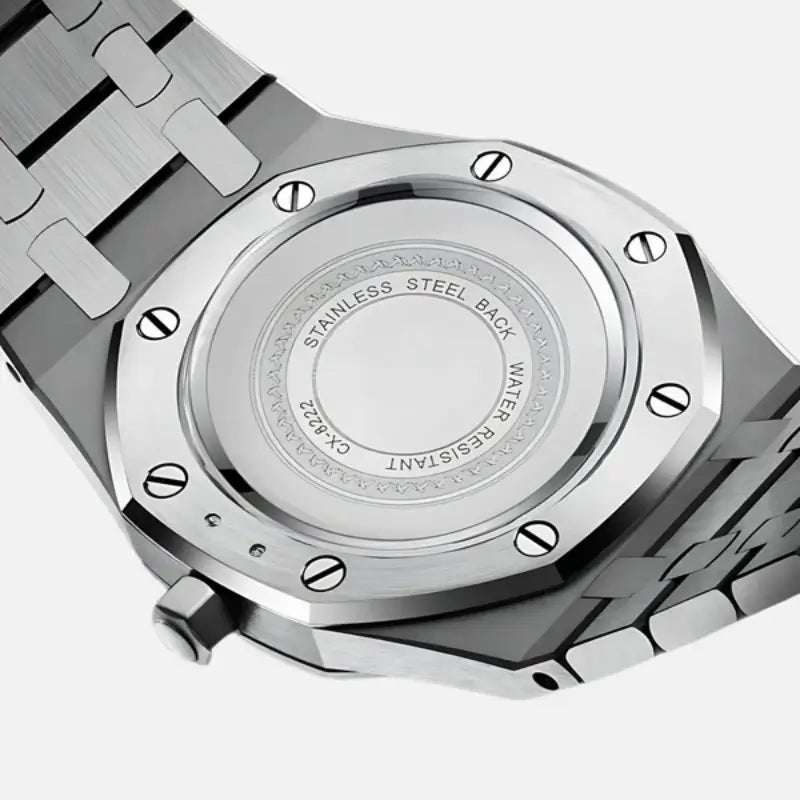 Close-up of the VEXO Kings Oak watch caseback showcasing stainless steel construction, water resistance, and polished screw-down detailing