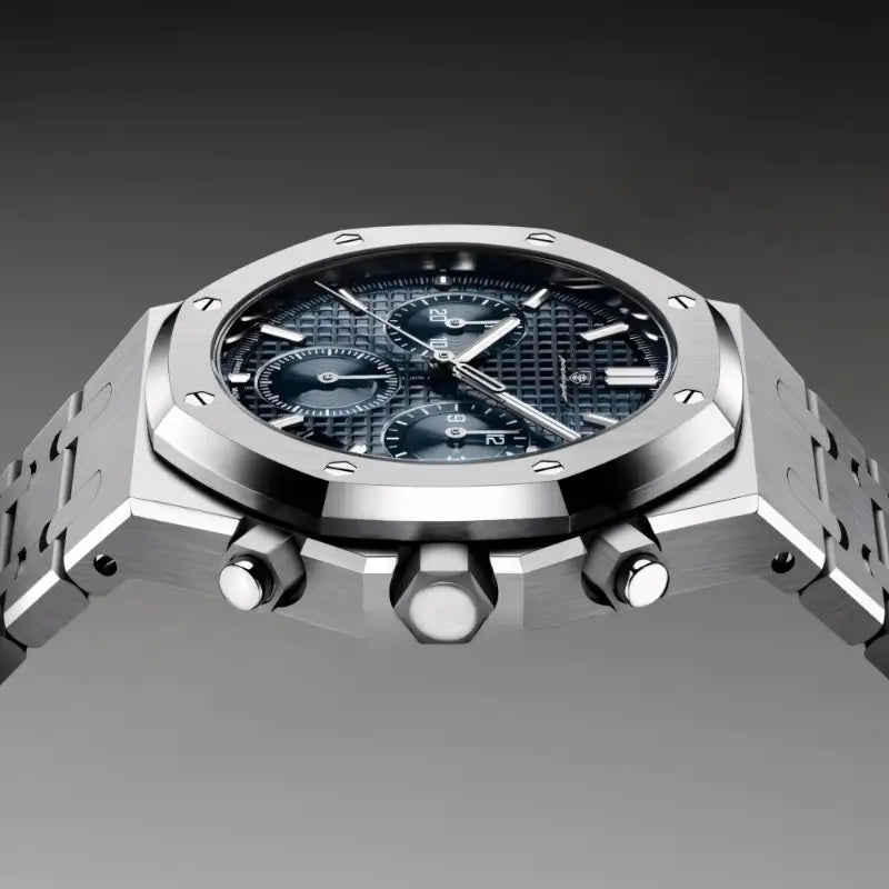 Side profile of the VEXO Kings Oak Chronograph Ocean featuring brushed stainless steel case, prominent chronograph pushers, and navy blue dial with navy blue sub-dials