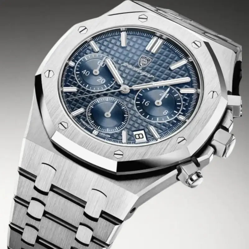 Close-up side angle of the VEXO Kings Oak Ocean Chronograph showing the deep blue patterned dial, stainless steel case, pushers, and integrated bracelet with high-detail brushed finish